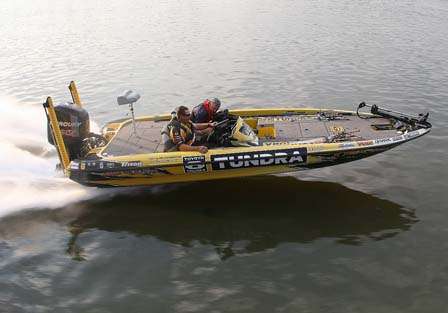 Terry Scroggins races to a spot where he caught 18 pounds in the first hour of Day Three.