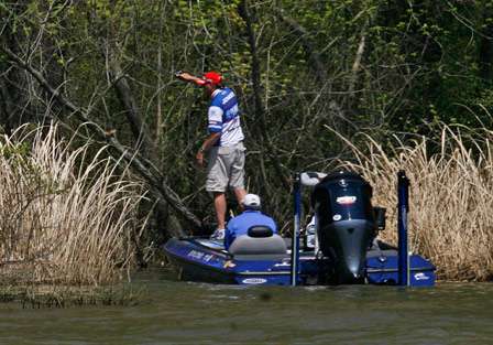 Jones pitches back into shallow water behind this break in the reeds.