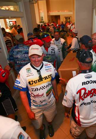 Dustin Wilks wades through the crowd, glad to be fishing the Elite Series again.