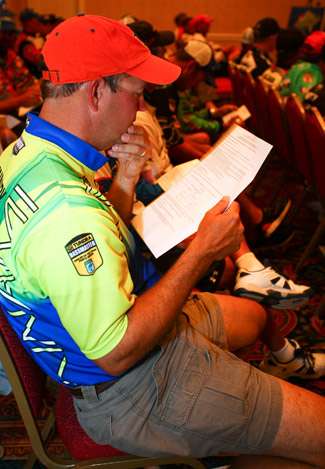 Steve Kennedy double checks the regulations during the angler briefing.