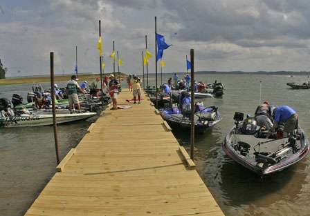 Boats in the first flight of the Trokar Battle on the Bayou gather around the check-in dock on Day One.
