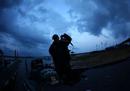 Fred Roumbanis dons his PFD as menacing clouds swirl overhead.