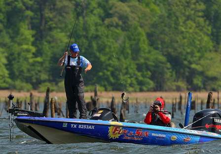 Schuff jerks a small fish in the boat while his Day Two Marshal takes a photo. 