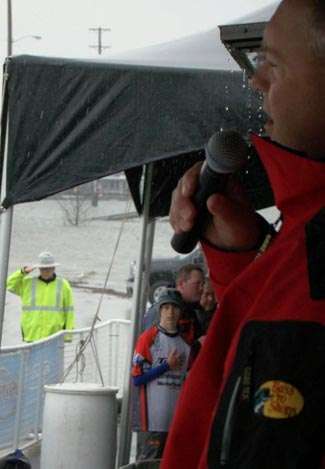 Tournament Manager Jon Stewart sang the National Anthem before the weigh-in on rainy Day Three.