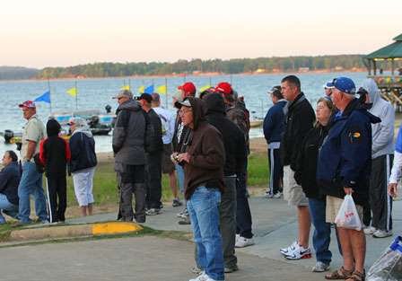 Spectators watch from the sidelines as the day gets ready to start.