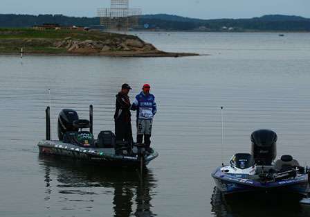 Fred Roumbanis gives Dean Rojas a ride to his boat on Day Four.