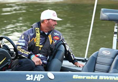 Gerald Swindle looks back as he launches his boat on Day Four of the TroKar Battle on the Bayou.