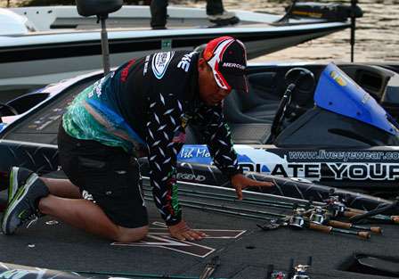 Chris Lane straps down his rods for the final day of competition.