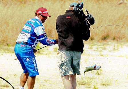 Marty DeShields captures the fish-catching action for Bassmaster television. 