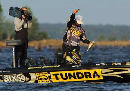 Swindle, who finished second by an ounce to Rojas, separates his jerkbait from a bass.
