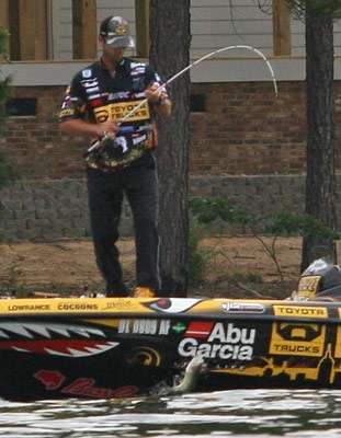 <p>
	Mike Iaconelli gets ready to swing another bass into the boat on Day Three.</p>
