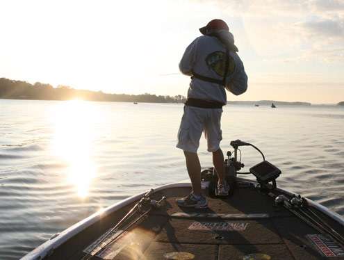 <p>
	As the sun continues to rise, Evers sets the hook on another nice bass.</p>
