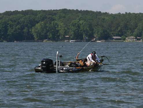 <p>
	Iaconelli reaches down to grab ahold of another keeper.</p>
