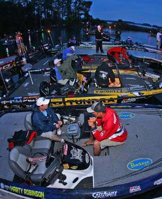 <p>
	Elite anglers prepare their tackle for the start of Day Three.</p>
