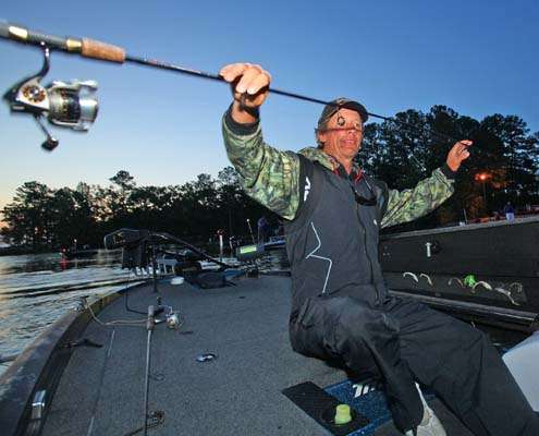 <p>
	Kevin Wirth pulls his rods from his rod box Sunday morning.</p>
