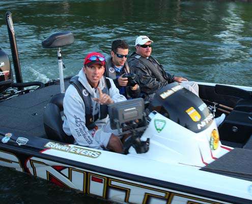 <p>
	Edwin Evers checks out on Day Four with his Marshal (far right) and Rob Russow of Bassmaster.com (center).</p>
