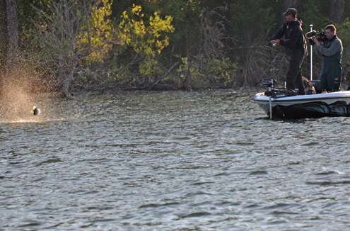 <p>
	A bass goes airborne as Casey Ashley pulls it towards the boat on Day Four of the Evan Williams Bourbon Carolina Clash.</p>
