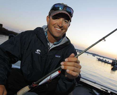 <p>
	Casey Ashley shows off a topwater bait he hopes keeps him on the top of the standings.</p>
