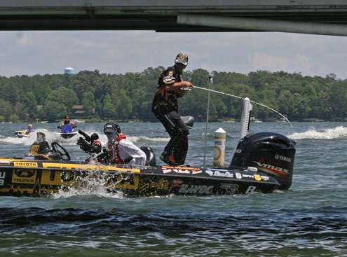 <p>
	This bass makes a big splash as it nears the boat.</p>

