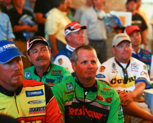 Scott Ashmore, Greg Vinson and Shaw Grigsby wait with their fellow anglers for the meeting to begin.