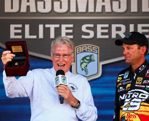 <p>
	Jerry McKinnis shows off the ring Kevin VanDam won at the 2011 Bassmaster Classic.</p>
