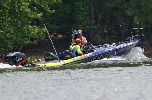 <p>
	As Kennedy moves with his trolling motor down to his next area just a short distance away, an ESPN cameraman films the action.</p>
