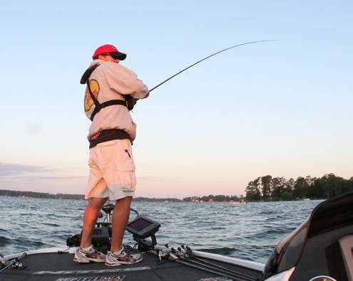 <p>
	Edwin Evers sets the hook on a fish early on Sunday.</p>
