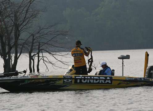 <p>
	Terry Scroggins decides to make a move and dons his PFD before starting the outboard.</p>
