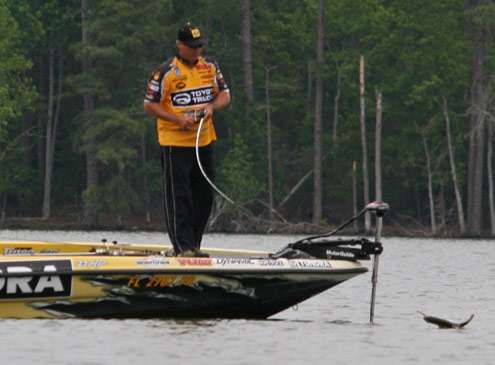 <p>
	Terry Scroggins drags this fish across the surface and into the boat.</p>
