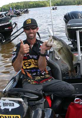 <p>
	Mike Iaconelli holds up a monster largemouth that he landed on Friday.</p>
