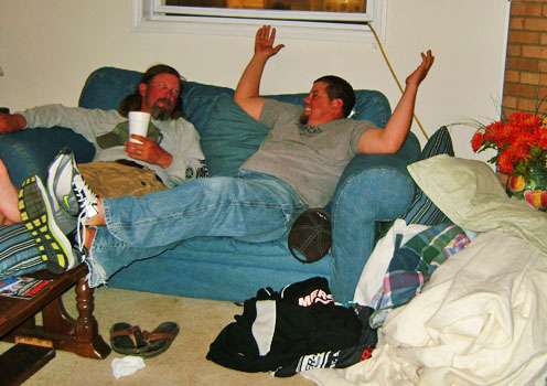 <p>
	Tony and Chris kick back after a long day.</p>
