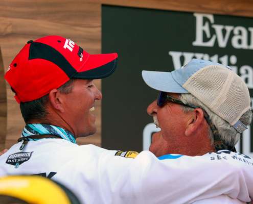 <p>
	Ashley gets a hug from his father, who was on the water watching Casey fish each day of the tournament.</p>
