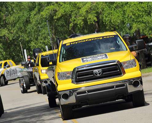 <p>
	A line of Toyota trucks towed the competitors to the stage for the weigh-in.</p>
