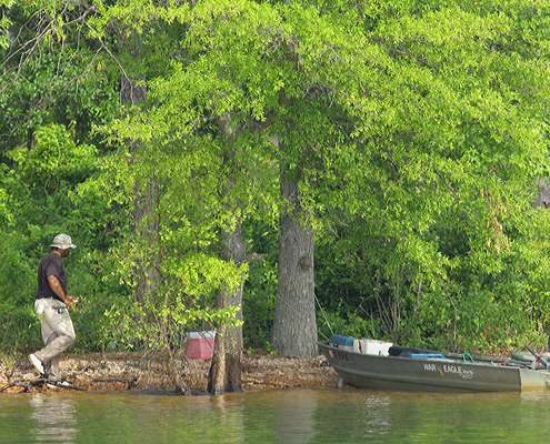<p>
	A local fisherman enjoying the lake.</p>
