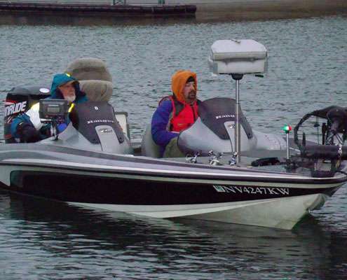 <p>
	Cold rain and cool temperatures kept anglers bundled up as they waited for takeoff.</p>
