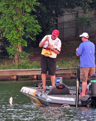 <p>
	Smith flips the largemouth into the boat and was off to a quick start.</p>

