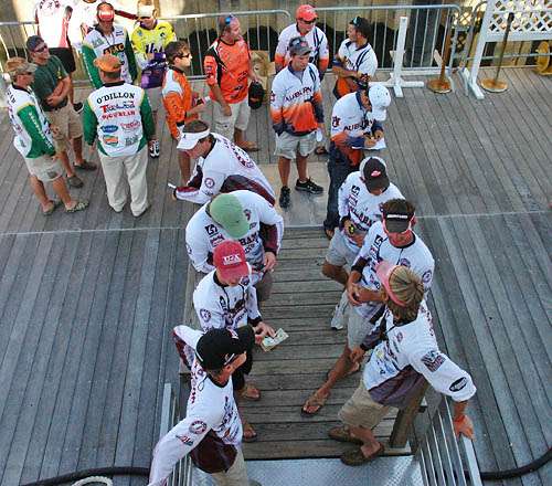 <p>
	The anglers meet at registration for the College B.A.S.S. East Super Regional in Montgomery, Ala.,</p>
