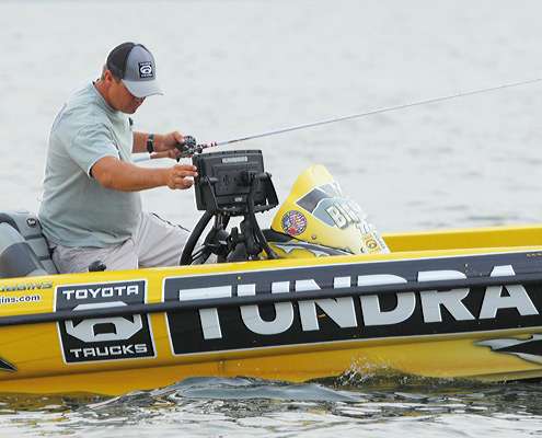 <p>
	Scroggins, who stands sixth in the Toyota Tundra Bassmaster Angler of the Year race, checks his GPS.</p>
