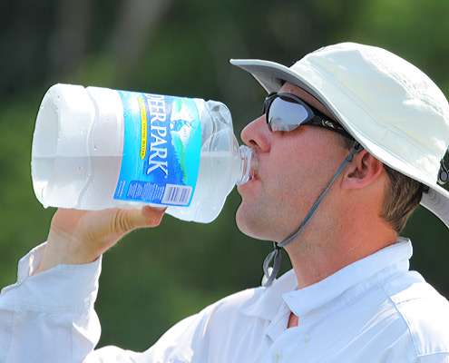 <p>
	With the day heating up, Aaron Martens make sure to drink plenty of water.</p>
