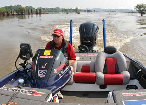 <p>
	Fast-moving, muddy water greeted Jones as he idled around the Arkansas River Monday.</p>
