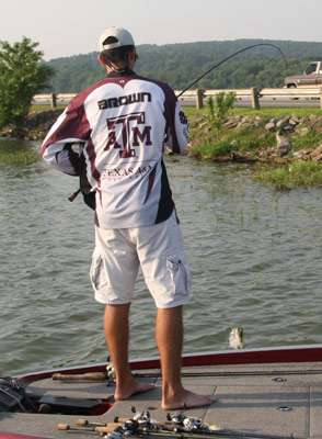 <p>
	Brown gets ready to swing the bass into the boat.</p>

