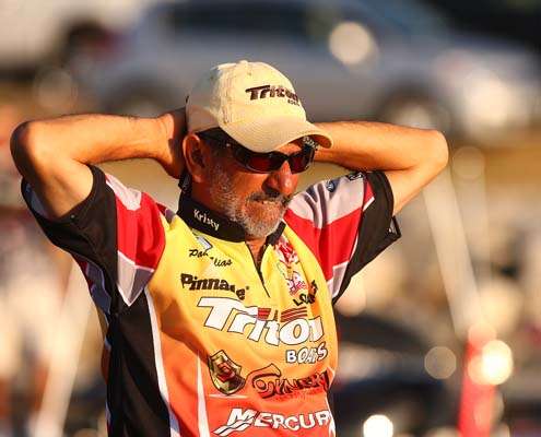 <p>
	Paul Elias relaxes while watching the anglers around him get ready for the day.</p>
