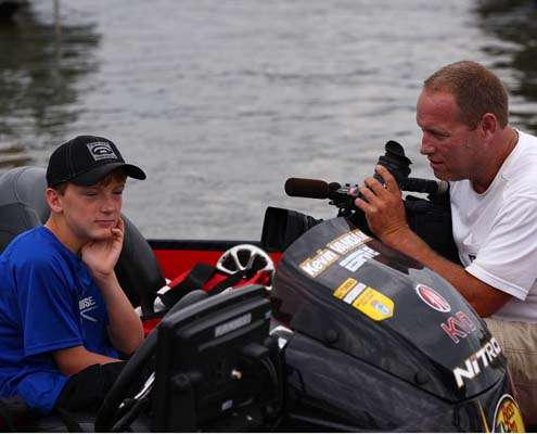 <p>
	Jackson VanDam sits in his father, Kevin VanDamâs, boat while Brian Mason rolls tape.</p>
