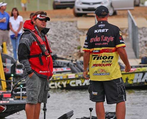 <p>
	Greg Hackney and Jeff Kriet visit while waiting for the start of Day Two.</p>
