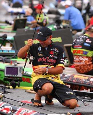 <p>
	Jeff Kriet gets his rods ready for Day Three.</p>
