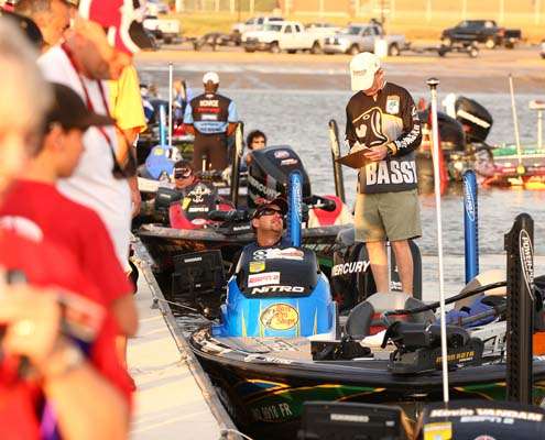<p>
	 </p>
<p>
	A Bassmaster tournament official visits with Ott DeFoe before the take-off.</p>
