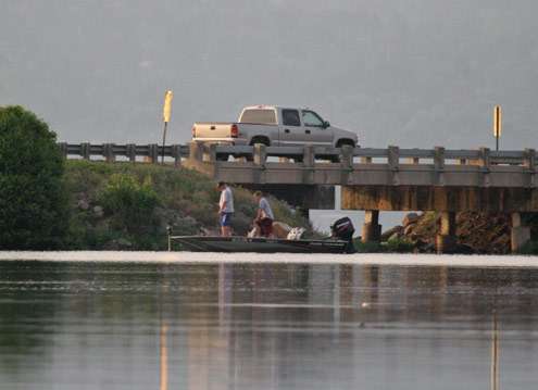 <p>
	A team fishes along one of the many bridges on Lake Dardanelle.</p>
