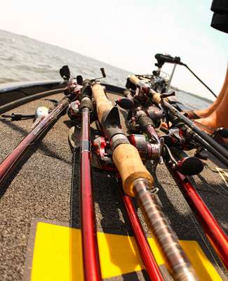 Unlike Hackney with only one rod on the deck of the boat, VanDam had at least a dozen rod and reels at the ready.
