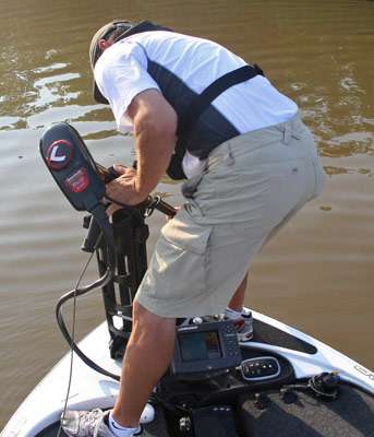 <p>
	 </p>
<p>
	Evers has to adjust the trolling motor to navigate the shallows.</p>
