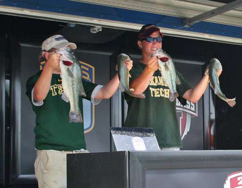 <p>
	Arkansas Techâs Jake Jacobs and Evan Smith show off some of their third-place fish weighing 13-4.</p>
